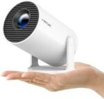 Upgrade your entertainment with this portable Mini Projector featuring WiFi, Bluetooth, built-in streaming apps, 1080P HD support, and a massive 130-inch display. Perfect for home theaters, outdoor movie nights, gaming, presentations, and streaming from smartphones, laptops, TV sticks, HDMI, and USB devices.
